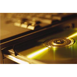 DVD being interted into a laptop