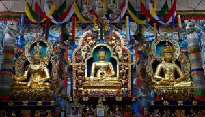 28-30a. Altar with Statues of Padmasambhava, Shakyamuni Buddha, and Amitayus, Namdroling Monastery, Bylakuppe, India, 2012, photo: H.S. Sahyadri, Wikimedia Commons.