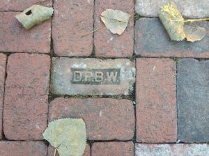 A 19th century brick manufactured at the site is built into the footpath around the Beacon Institute