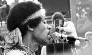 Jimi Hendrix performing at Woodstock Festival