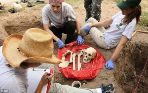 Dr. Lori Baker and her team cataloging a set of bones uncovered at the mass grave site in Falfurrias, Texas.
