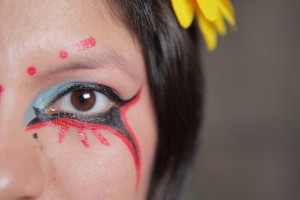 Picture showing the colorful and creative designs Inocente uses in her make-up.