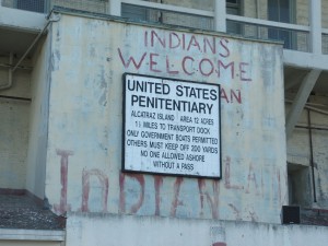 Writing which is still visible on a building on Alcatraz Island from the 1969 occupation which reads, "Indians Welcome"