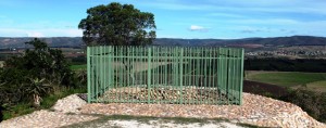 Sarah Baartman's grave site, located in the East Cape near her birth place. It is now surrounded by a fence due to a history of vandalism. 