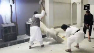 Photos from ISIS propaganda video depicting the destruction of sculptures in the Mosul Museum in March, 2014