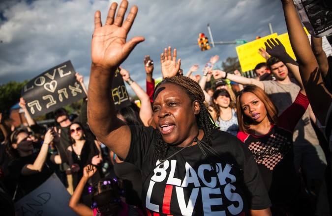 Rally Held In Baltimore Day After Charges Announced Against Officers Involved In Freddie Gray Death
