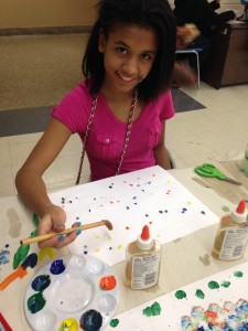 Aniyah working on her painting!
