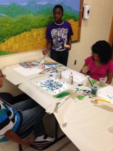 Aaron and Aniyah working on their paintings!