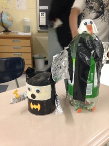 Jackie and Brian constructed Batman and the Penguin out of recycled bottles